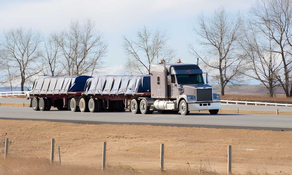 Flatbed trailer carrying specialized oversized freight